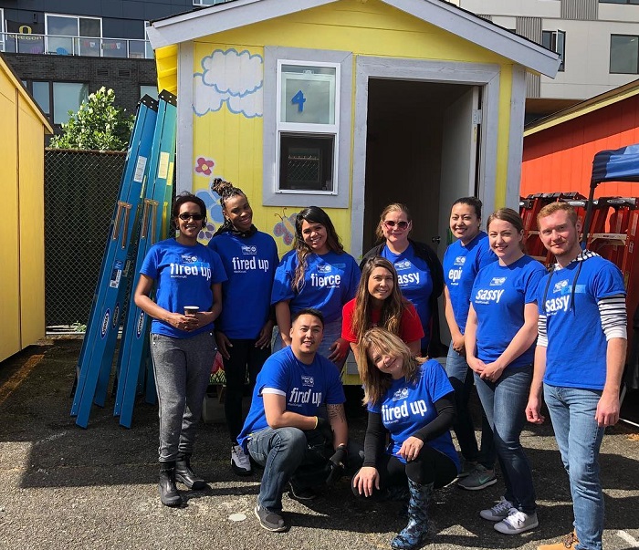 Fortivus Edge Online Bank team volunteering to help build tiny homes.